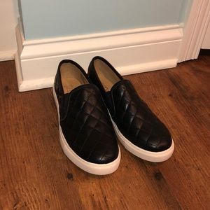 Brand new pair of black slip on shoes!